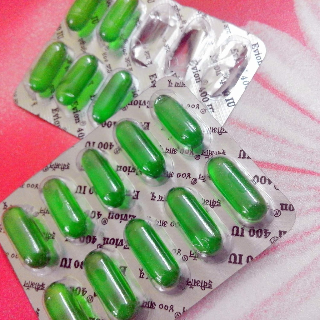 顔、毛、丘疹、輝く肌、ダークサークル、スキンホワイトニング&ヘアケアEvion 400mgカプセル(50)